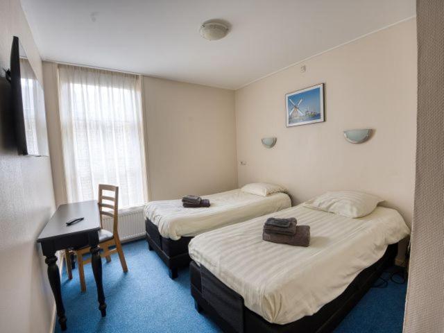 Sexbierum Hotel De Harmonie מראה חיצוני תמונה